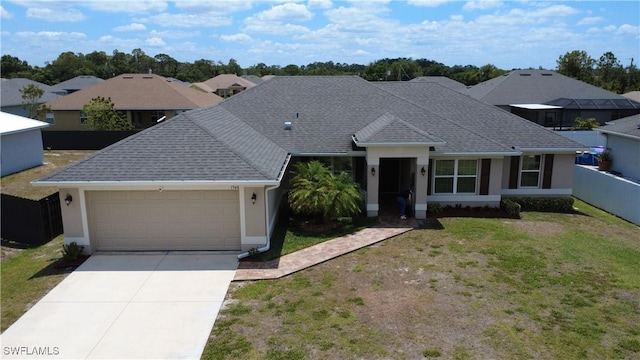 1948 Redmont Ave, Lehigh Acres, FL 33972 - single story home featuring an attached garage, concrete driveway, stucco siding, and a residential view