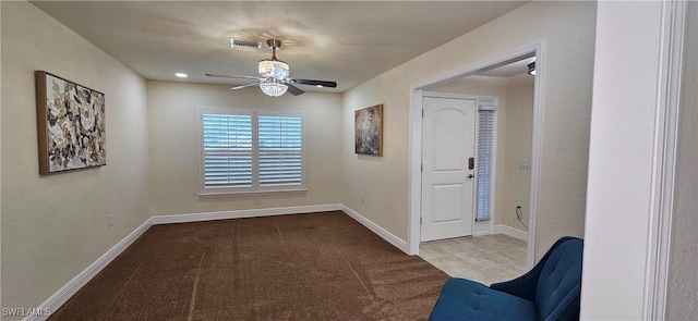 1948 Redmont Ave, Lehigh Acres, FL 33972 - empty room with ceiling fan, baseboards, and carpet floors