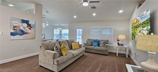 1948 Redmont Ave, Lehigh Acres, FL 33972 - carpeted living room with ceiling fan, recessed lighting, and lofted ceiling