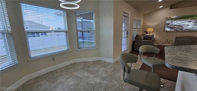 1948 Redmont Ave, Lehigh Acres, FL 33972 - home office with baseboards, vaulted ceiling, and tile patterned flooring