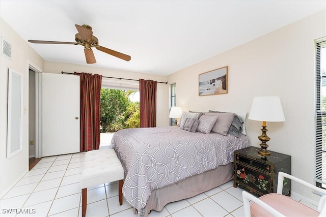 116 Short Ct, Naples, FL 34112 - tiled bedroom with a ceiling fan and access to exterior