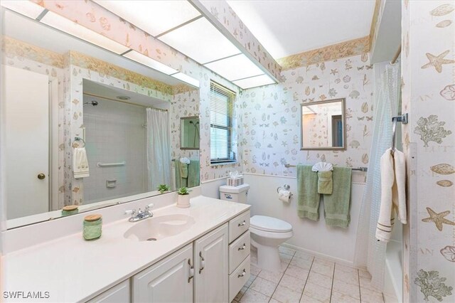 116 Short Ct, Naples, FL 34112 - bathroom with wallpapered walls, vanity, and tile patterned flooring