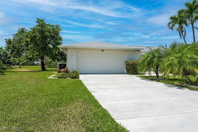 view of front of home with driveway, a front yard, stucco siding, cooling unit, and a garage