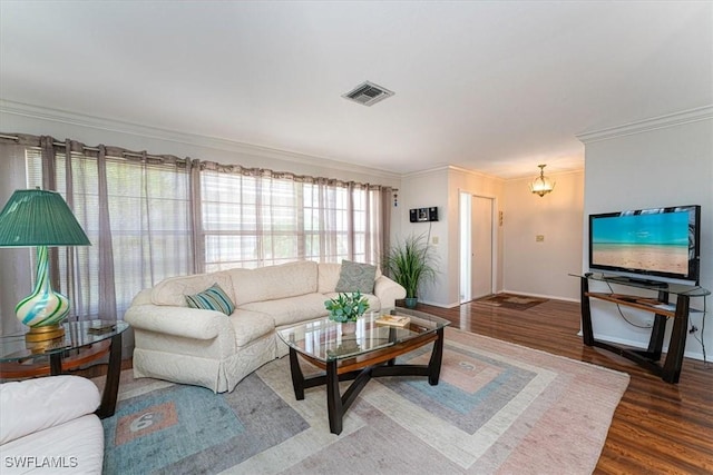 116 Short Ct, Naples, FL 34112 - living area with ornamental molding and wood finished floors