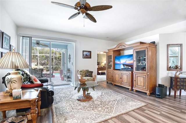 816 Mount Hood Ct, Naples, FL 34104 - living area with a ceiling fan and wood finished floors