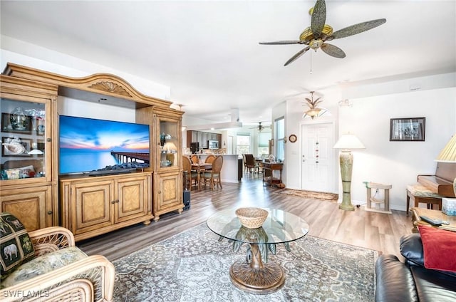 816 Mount Hood Ct, Naples, FL 34104 - living area with ceiling fan, wood finished floors, and baseboards