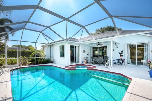 816 Mount Hood Ct, Naples, FL 34104 - view of swimming pool with a patio area, ceiling fan, and a pool with connected hot tub