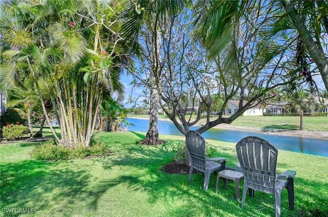816 Mount Hood Ct, Naples, FL 34104 - view of green lawn with a water view
