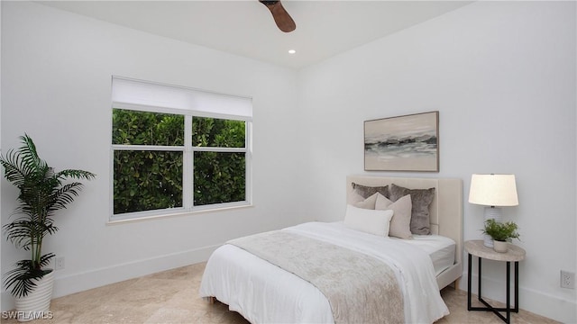 3936 Deep Passage Way, Naples, FL 34109 - bedroom with baseboards and a ceiling fan