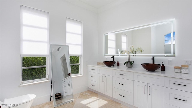 3936 Deep Passage Way, Naples, FL 34109 - bar area featuring a sink