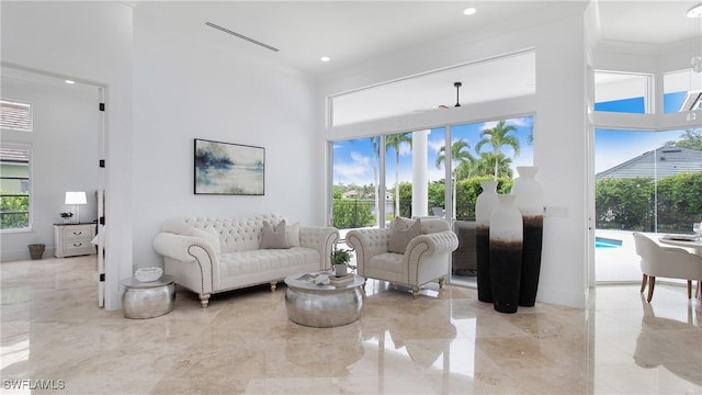 3936 Deep Passage Way, Naples, FL 34109 - living room with a high ceiling, marble tiled flooring, and recessed lighting