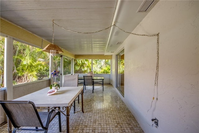 7232 Saint Anns Ct, Fort Myers, FL 33908 - sunroom / solarium with outdoor dining area