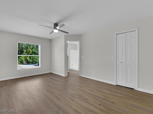 3521 SE Santa Barbara Pl, Cape Coral, FL 33914 - unfurnished room featuring wood finished floors, a ceiling fan, and baseboards