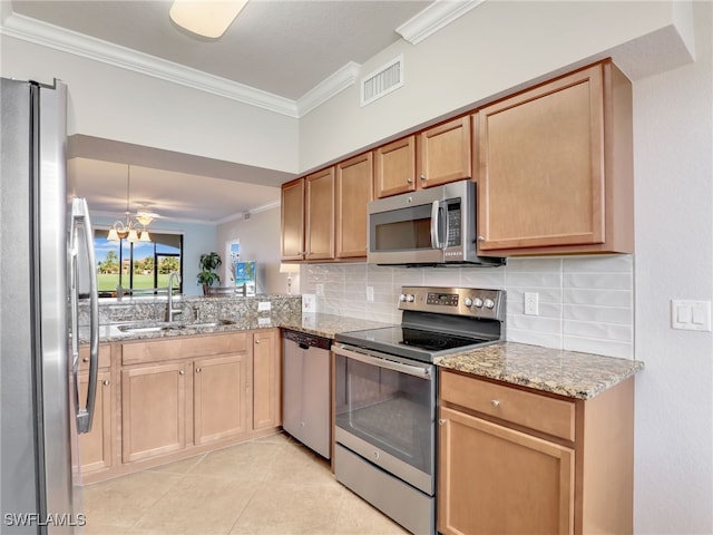 17961 Bonita National Blvd Unit 514, Bonita Springs, FL 34135 - kitchen with appliances with stainless steel finishes, ornamental molding, backsplash, light stone countertops, and light tile patterned floors