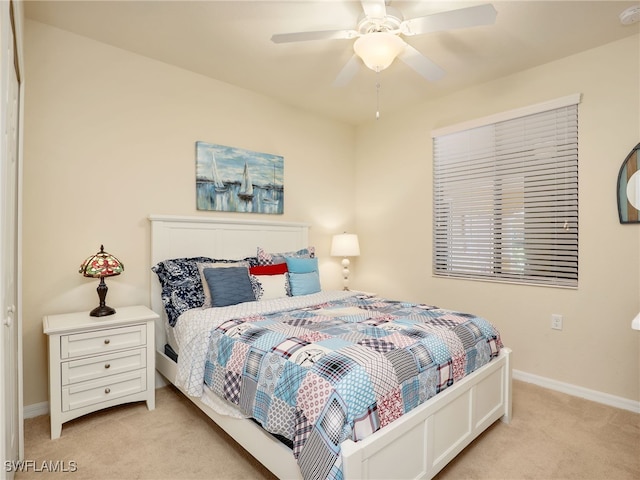 17961 Bonita National Blvd Unit 514, Bonita Springs, FL 34135 - bedroom with light carpet and a ceiling fan