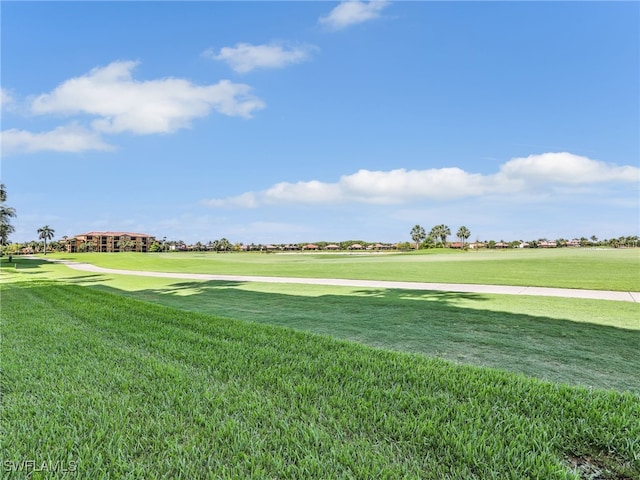 17961 Bonita National Blvd Unit 514, Bonita Springs, FL 34135 - view of community with golf course view and a lawn