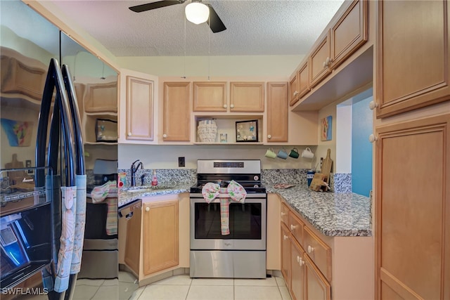 9950 Sailview Ct Unit 14, Fort Myers, FL 33905 - kitchen featuring stainless steel appliances, a sink, light tile patterned floors, ceiling fan, and a textured ceiling