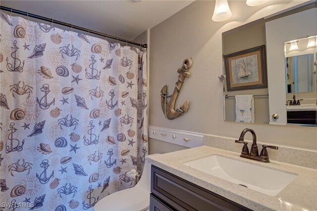 9950 Sailview Ct Unit 14, Fort Myers, FL 33905 - full bath with vanity, toilet, and a shower with curtain