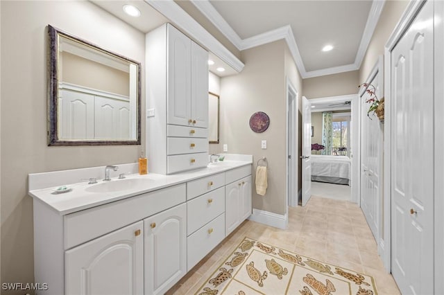 3008 Turtle Gait Ln, Sanibel, FL 33957 - ensuite bathroom featuring crown molding, double vanity, baseboards, and recessed lighting