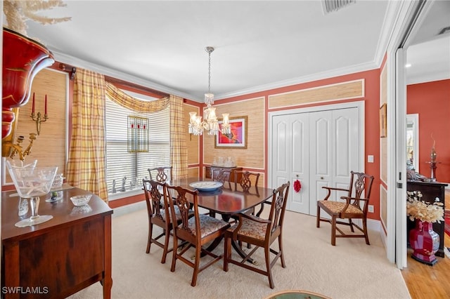 3008 Turtle Gait Ln, Sanibel, FL 33957 - dining space with a chandelier, crown molding, baseboards, and carpet floors