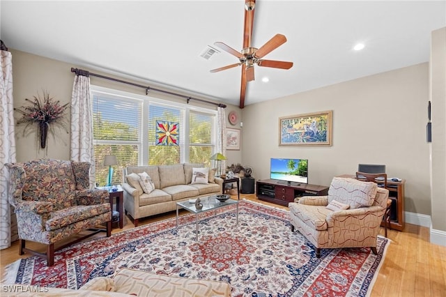 3008 Turtle Gait Ln, Sanibel, FL 33957 - living room with wood finished floors, a ceiling fan, recessed lighting, and baseboards