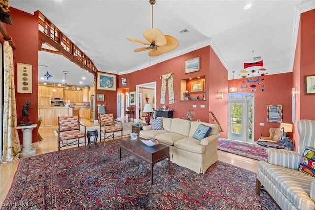 3008 Turtle Gait Ln, Sanibel, FL 33957 - living area with light wood-style floors, ceiling fan, ornamental molding, and recessed lighting