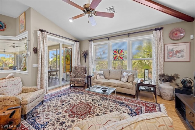 3008 Turtle Gait Ln, Sanibel, FL 33957 - living area featuring lofted ceiling, wood finished floors, and a ceiling fan