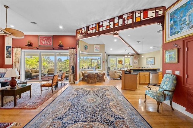 3008 Turtle Gait Ln, Sanibel, FL 33957 - living room with light wood finished floors, recessed lighting, ceiling fan, and baseboards