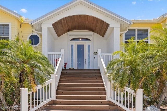 3008 Turtle Gait Ln, Sanibel, FL 33957 - doorway to property featuring stucco siding