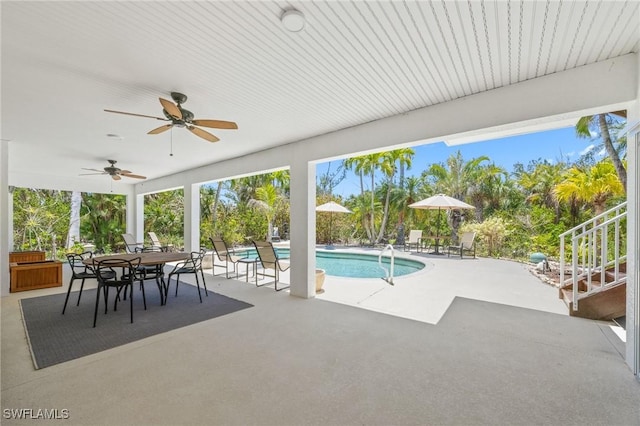 3008 Turtle Gait Ln, Sanibel, FL 33957 - swimming pool featuring a patio area, ceiling fan, and outdoor dining space