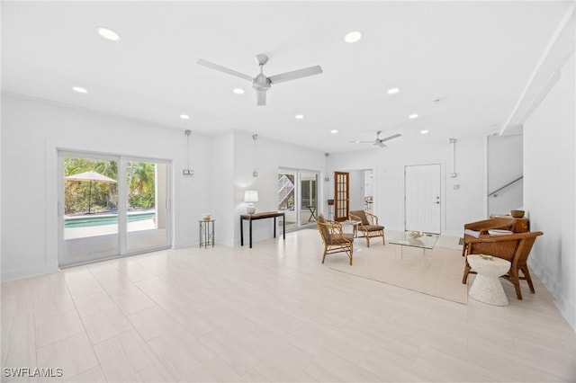 3008 Turtle Gait Ln, Sanibel, FL 33957 - living area with ceiling fan, recessed lighting, and french doors