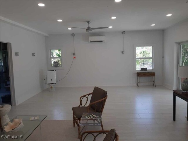 3008 Turtle Gait Ln, Sanibel, FL 33957 - living area featuring a wall mounted AC, recessed lighting, and ceiling fan