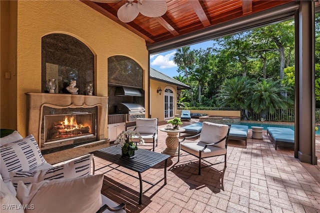1419 Hemingway Pl, Naples, FL 34103 - view of patio with ceiling fan, an outdoor living space, and french doors