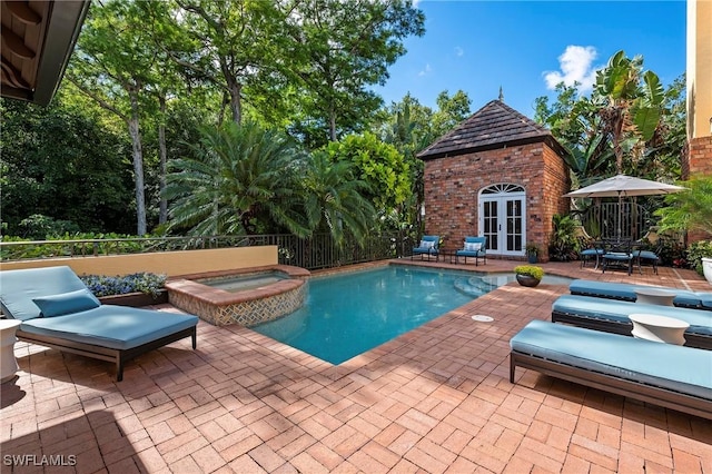 1419 Hemingway Pl, Naples, FL 34103 - view of swimming pool featuring french doors, a patio, and a pool with connected hot tub