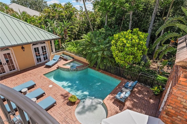 1419 Hemingway Pl, Naples, FL 34103 - view of pool with french doors, a patio, and a pool with connected hot tub