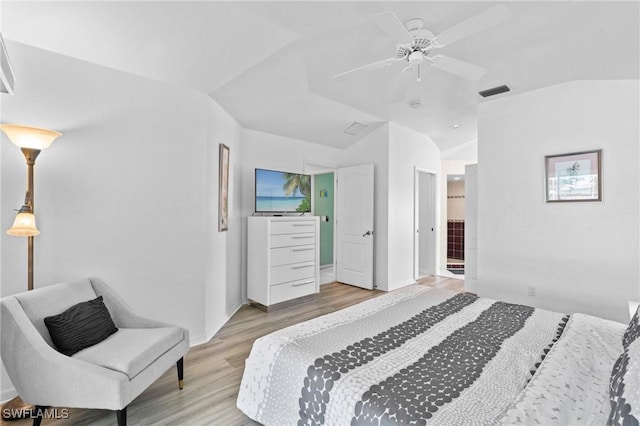2005 SE 21st St, Cape Coral, FL 33990 - bedroom with vaulted ceiling, light wood finished floors, a ceiling fan, and baseboards