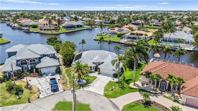 2005 SE 21st St, Cape Coral, FL 33990 - aerial perspective of suburban area with a large body of water