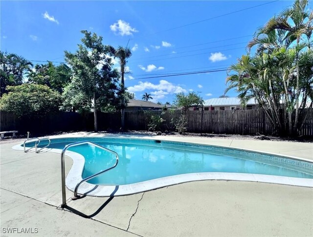 844 106th Ave N, Naples, FL 34108 - view of pool featuring a fenced backyard and a patio