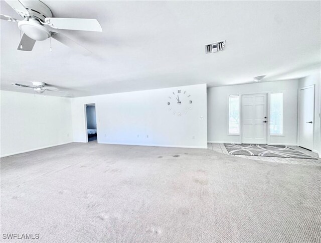 844 106th Ave N, Naples, FL 34108 - carpeted spare room with baseboards and ceiling fan