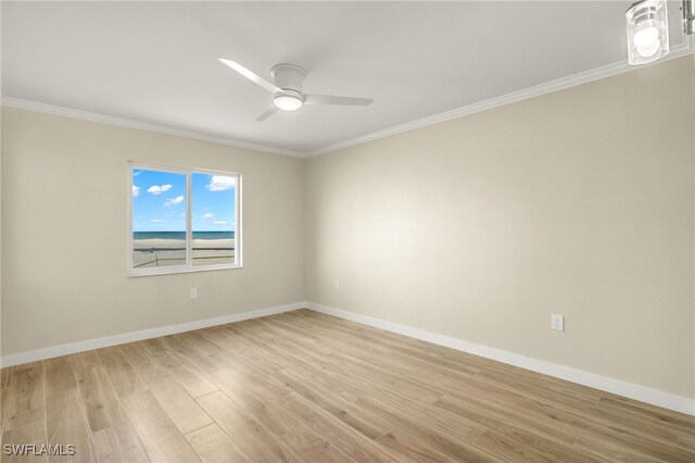 7400 Estero Blvd Unit 125, Fort Myers Beach, FL 33931 - empty room with light wood-type flooring, ornamental molding, a ceiling fan, and baseboards