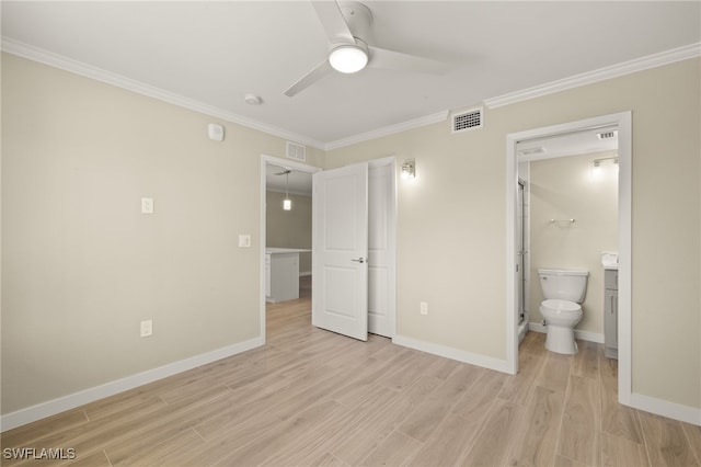 7400 Estero Blvd Unit 125, Fort Myers Beach, FL 33931 - unfurnished bedroom with ornamental molding, light wood-type flooring, baseboards, ensuite bath, and ceiling fan