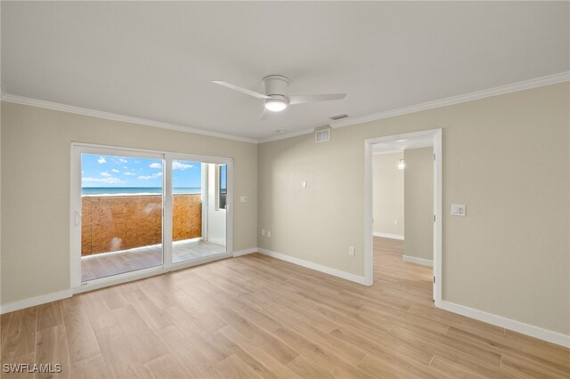 7400 Estero Blvd Unit 125, Fort Myers Beach, FL 33931 - empty room with light wood-style flooring, a ceiling fan, ornamental molding, and baseboards