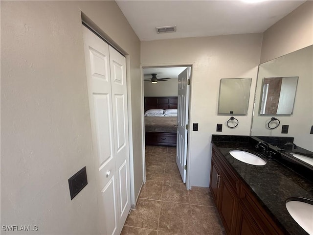 4335 18th Ave SE, Naples, FL 34117 - bathroom featuring double vanity, tile patterned flooring, and a ceiling fan