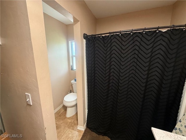 4335 18th Ave SE, Naples, FL 34117 - bathroom with tile patterned flooring, toilet, and curtained shower