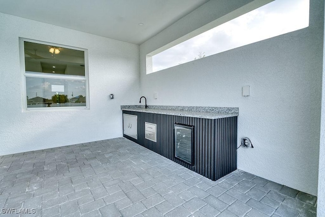 view of patio / terrace featuring exterior kitchen