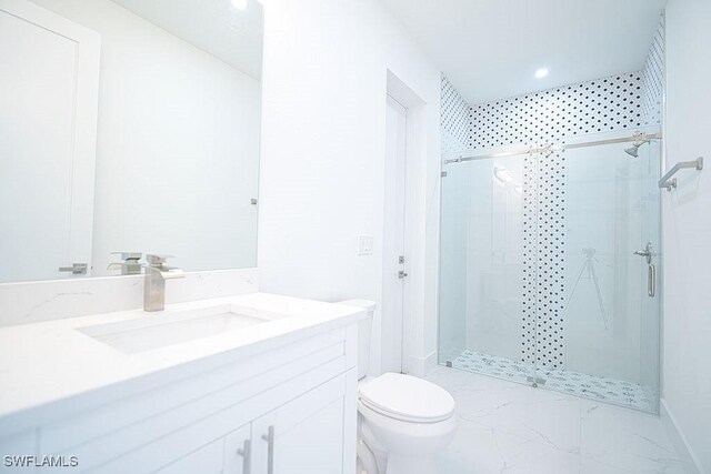 full bathroom featuring marble finish floors, toilet, a shower stall, vanity, and recessed lighting