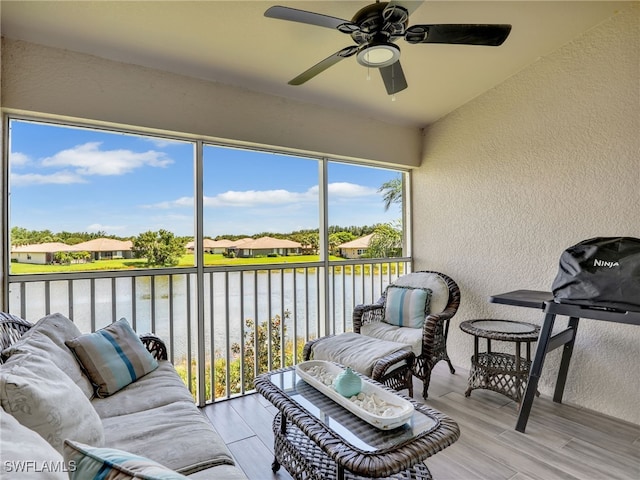 19920 Barletta Ln Unit 1423, Estero, FL 33928 - sunroom / solarium with a water view, a ceiling fan, a residential view, and outdoor lounge area