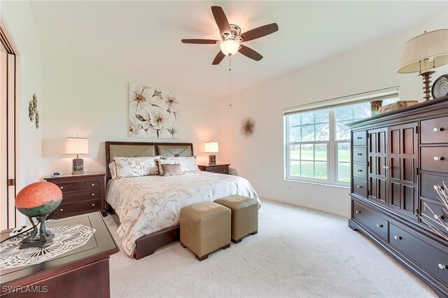 bedroom with carpet flooring, ceiling fan, and baseboards