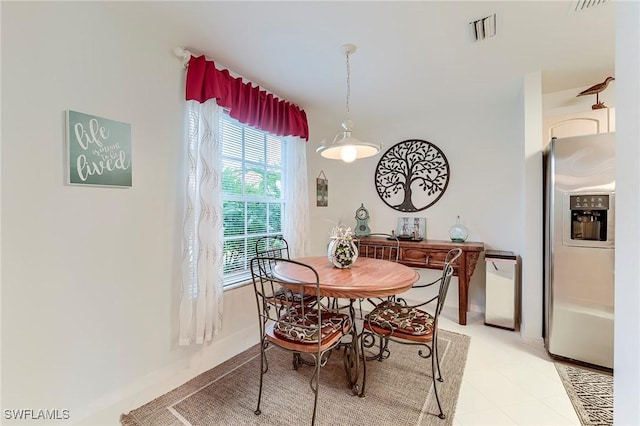 dining room featuring baseboards