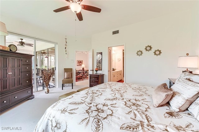 bedroom with access to exterior, carpet flooring, a ceiling fan, and ensuite bath